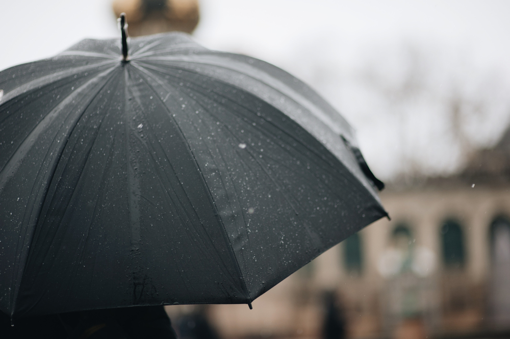 Close-up,Of,Wet,Umbrella.,Full,Frame,Shot,Of,Raindrops,On